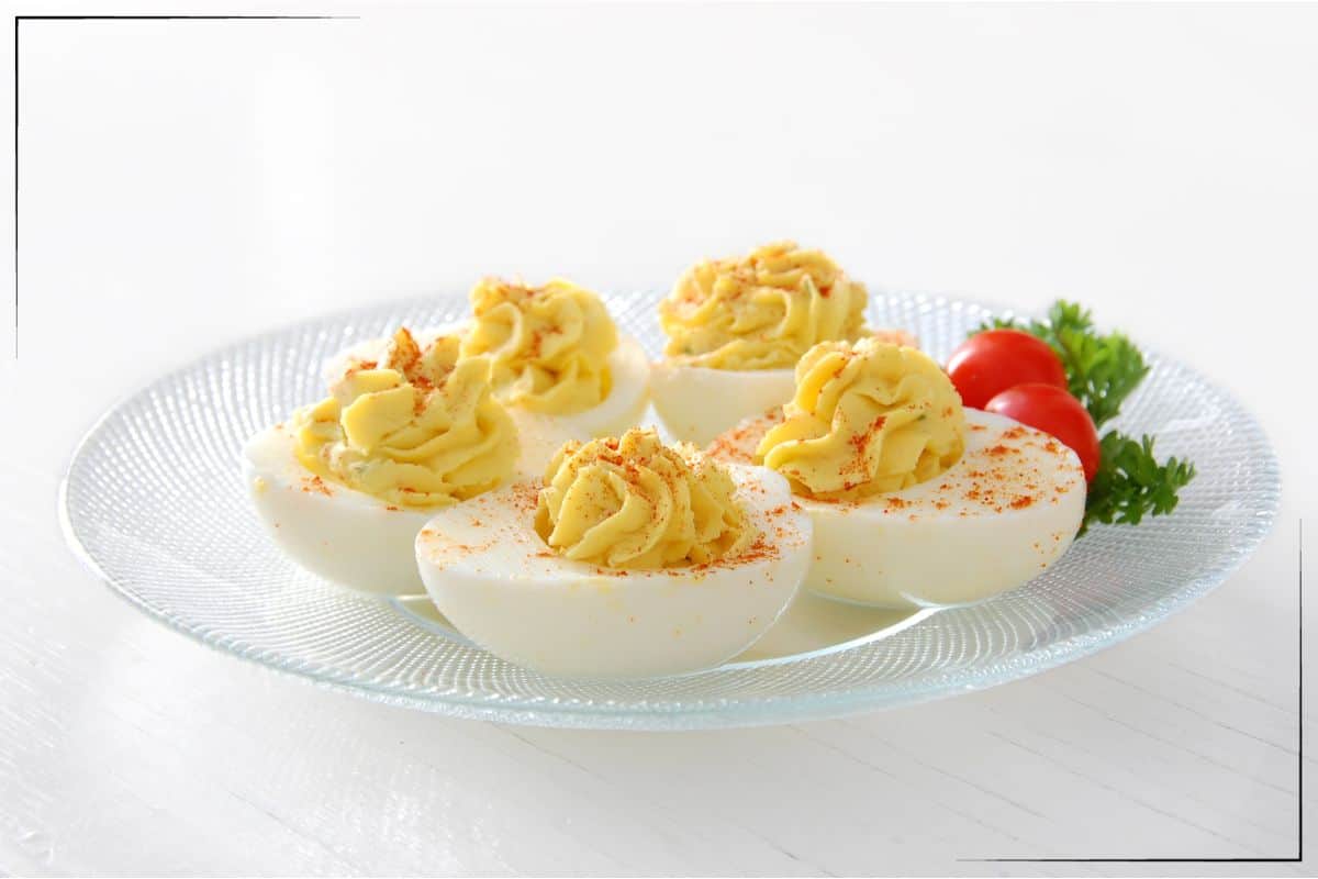 Deviled Eggs in a glass dish.