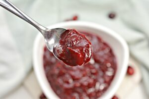 Cranberry Sauce close up on a spoon.