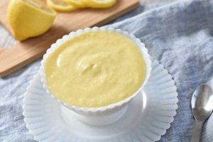 A bowl of lemon pudding.