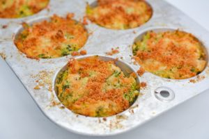 Baked Cheesy Chicken and Broccoli Casserole in muffin tins.