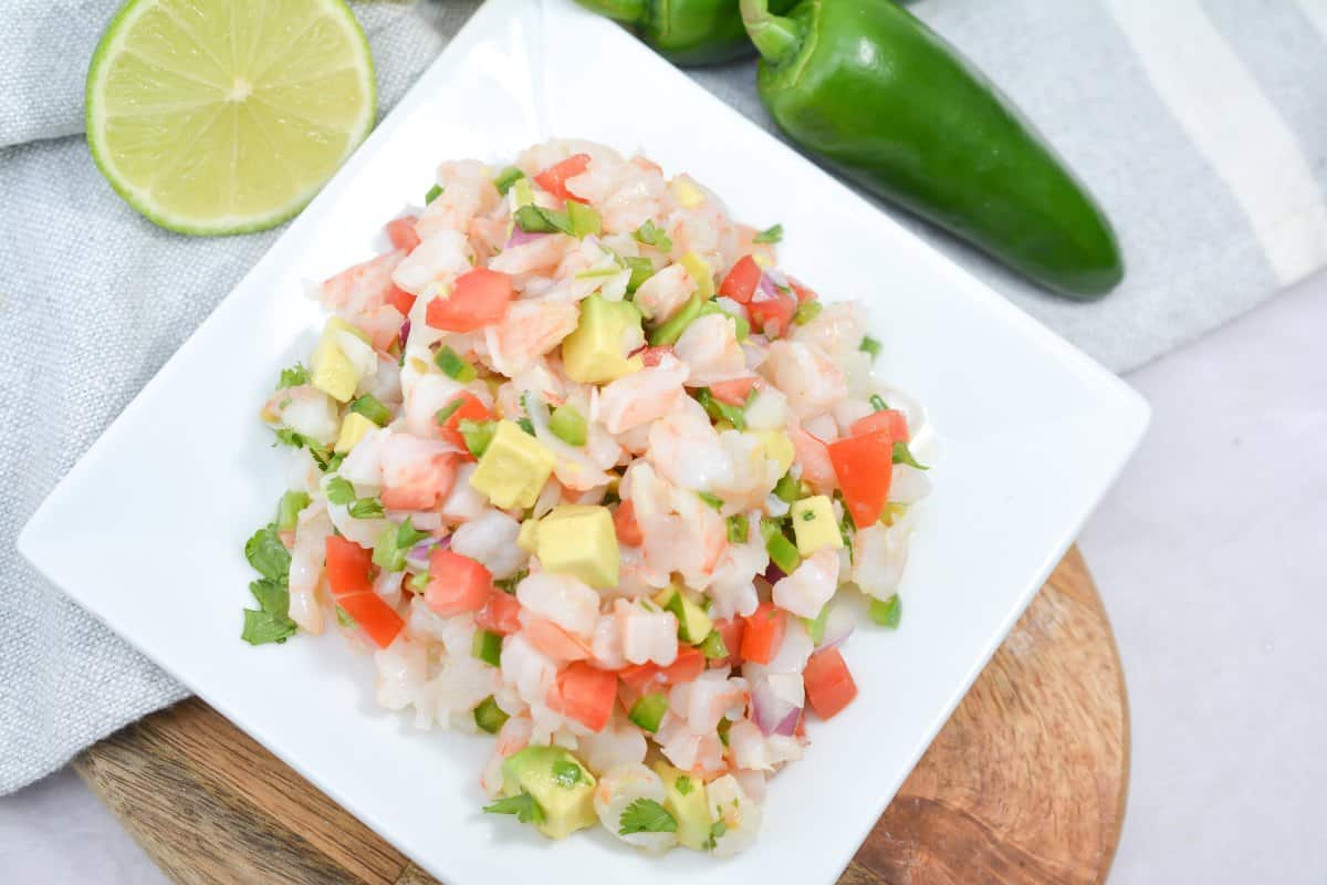 Shrimp Ceviche on a white plate.