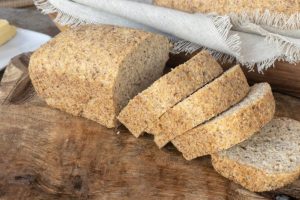 Mini Bread Loaves on a cutting board.