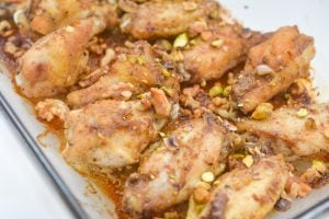 Baklava chicken wings on a baking sheet.