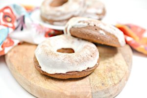 Glazed Donuts on a cutting board.