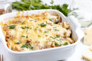 Chicken Cordon Bleu Casserole in a white casserole dish.
