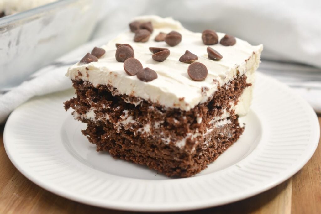 Chocolate icebox cake on a white plate.