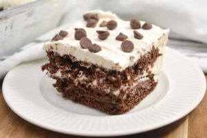 Chocolate icebox cake on a white plate.