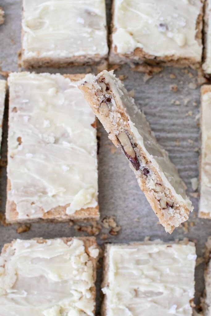 Magic Cookie Bars with one on its side.