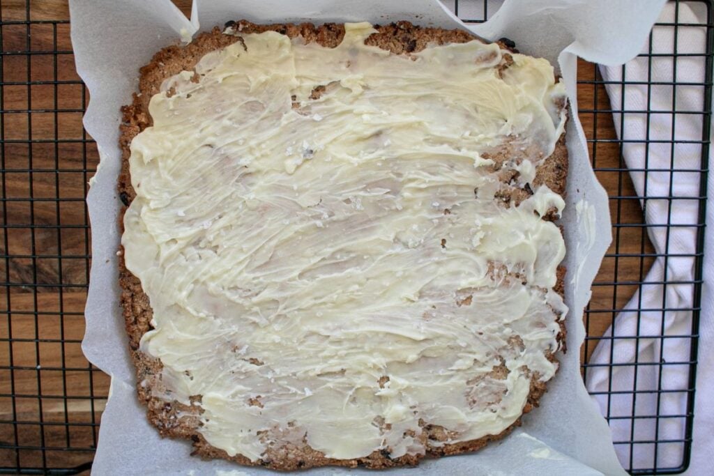 Magic Cookie Bars on parchment paper.