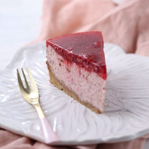 Keto raspberry cheesecake on a plate.