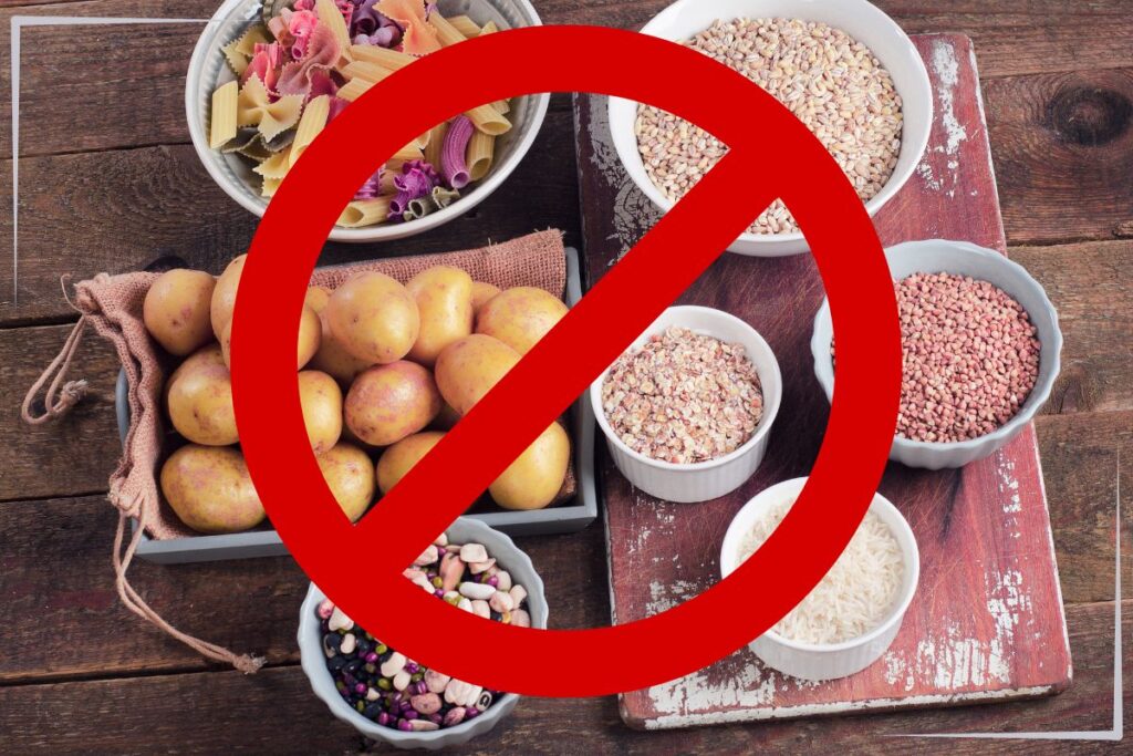 A bunch of high carb foods with a slash through them.