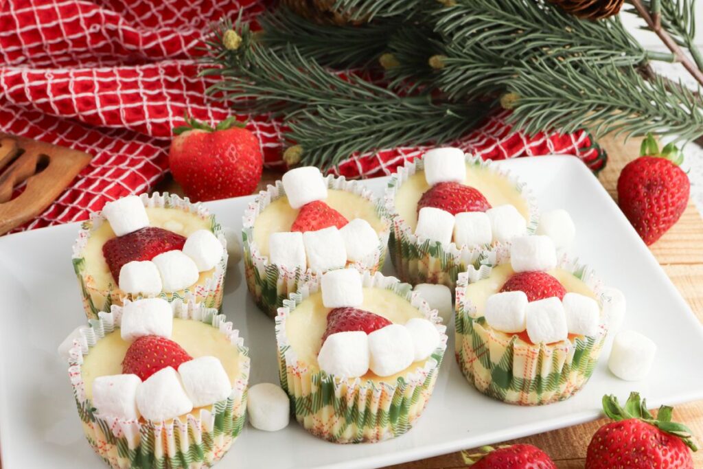 Mini Keto Santa Cheesecakes on a white platter.