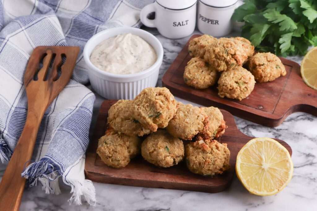 Mini Keto Crab Cakes on a wooden board.