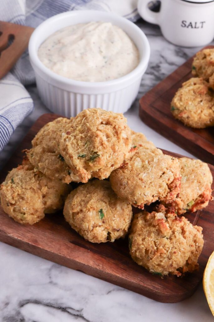 Mini Keto Crab Cakes on a wooden plate.