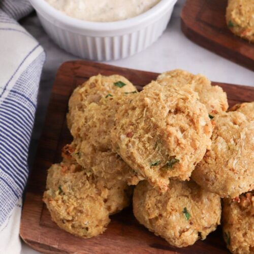 Mini Keto Crab Cakes on a wooden plate.