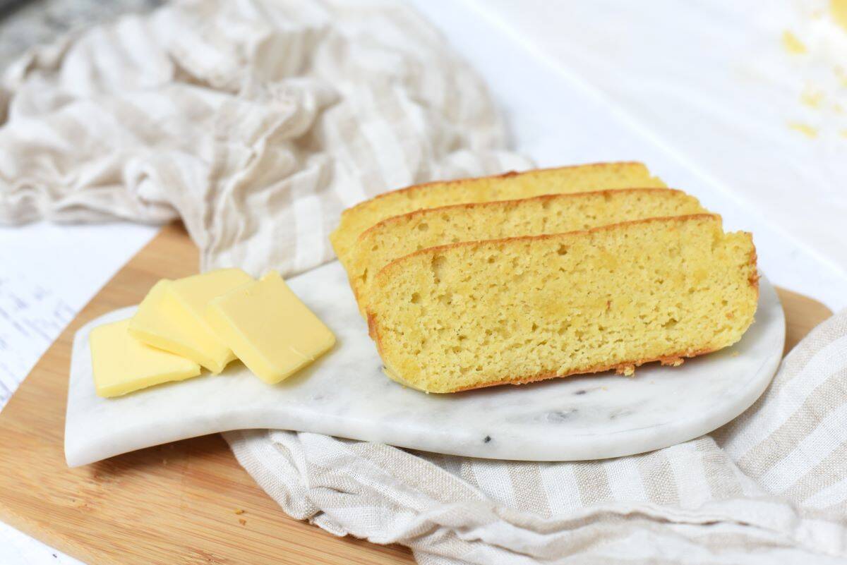 Honey Keto Bread with butter on a platter.