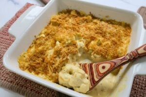 Carnivore Mac and Cheese in a baking dish with a spoon.