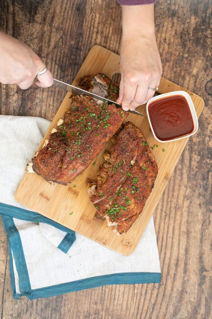 Keto Instant Pot Ribs on a cutting board.