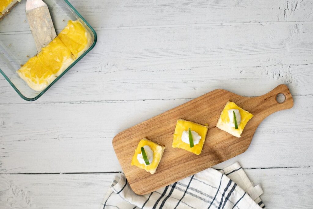 Keto Key Lime Bars on a board.