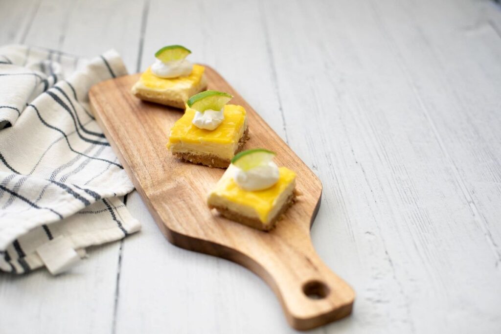 Keto Key Lime Bars on a board.
