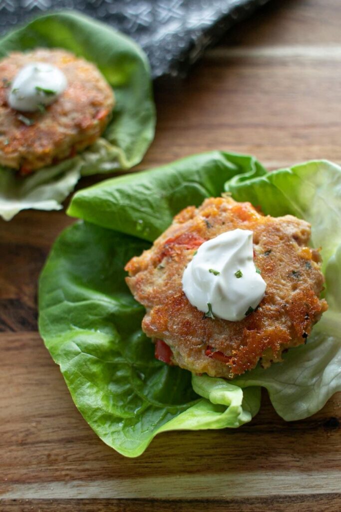 A Keto Tuna Cake on a piece of lettuce.