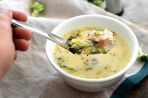 A spoonful of Low Carb Broccoli and Cheese Soup With Chicken.