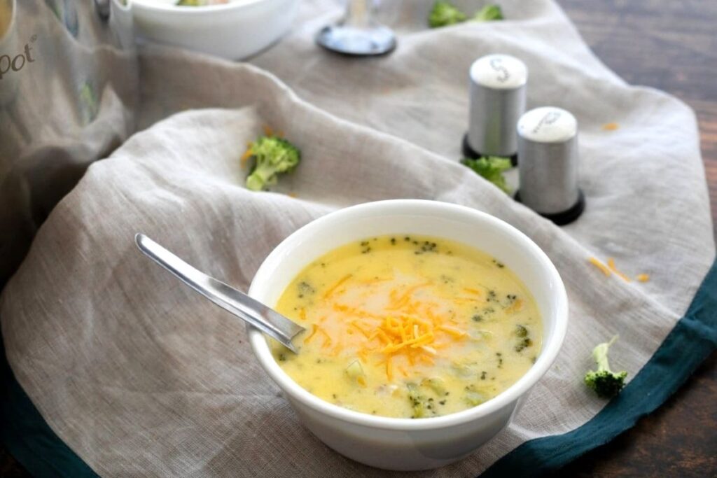 A bowl of Low Carb Broccoli and Cheese Soup With Chicken.