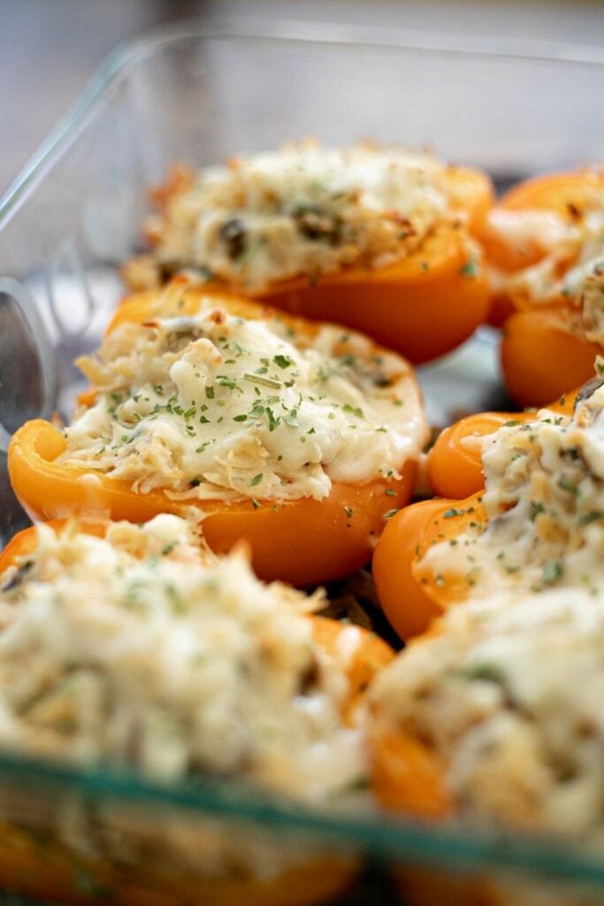 Low Carb Chicken Stuffed Peppers in a baking dish.