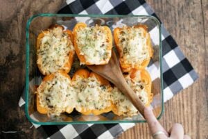 Low Carb Chicken Stuffed Peppers in a baking dish.