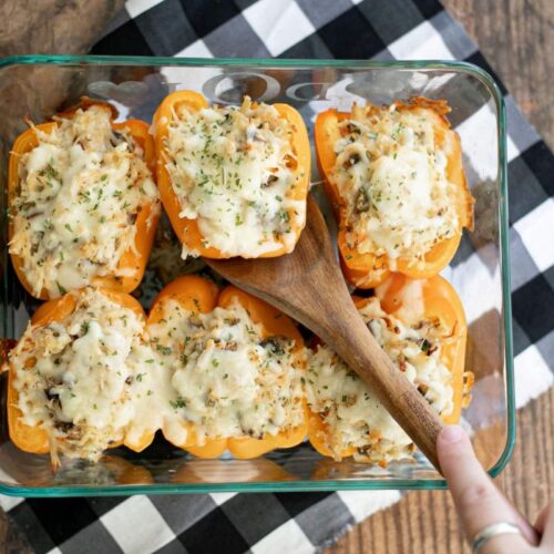 Low Carb Chicken Stuffed Peppers in a baking dish.